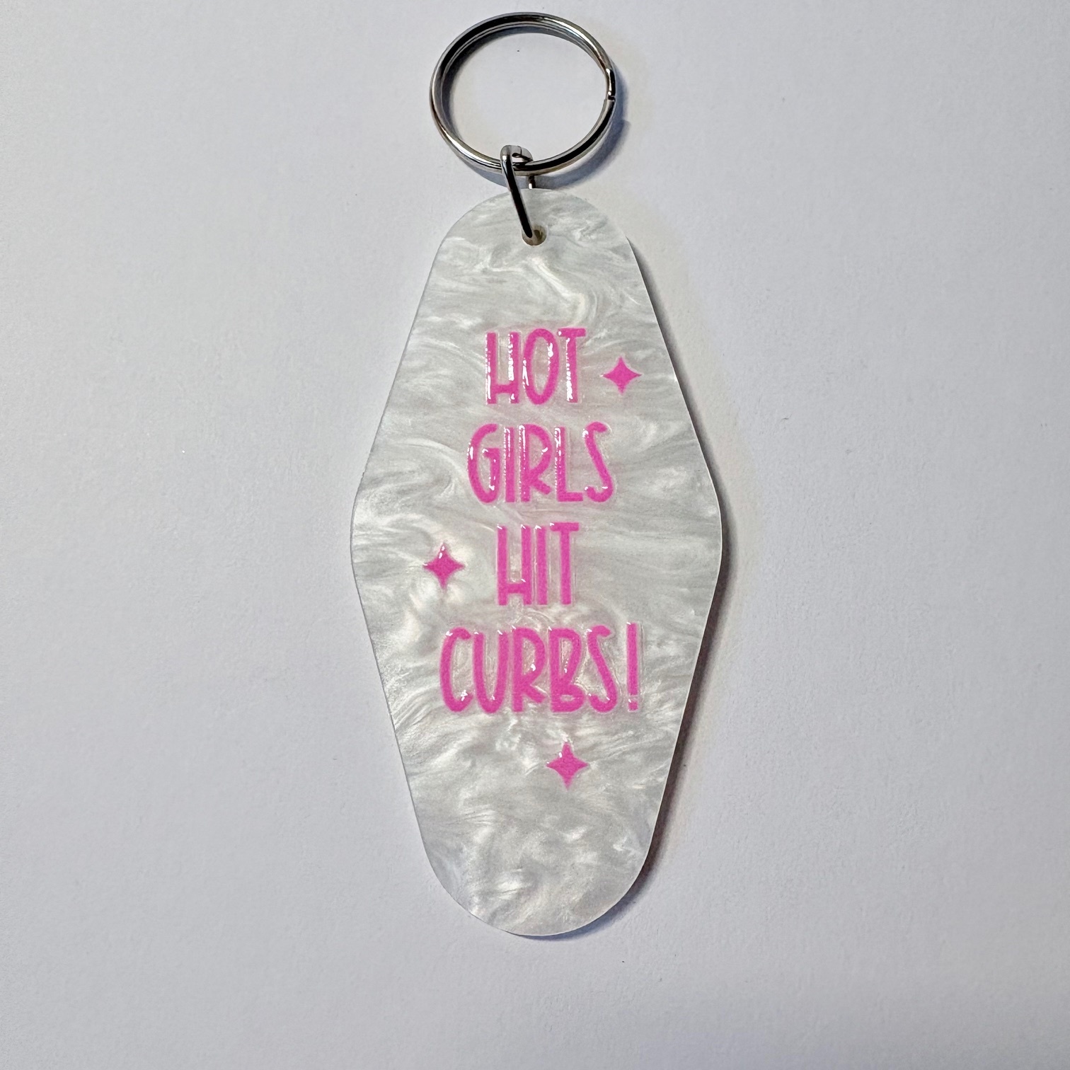 "Hot Girls Hit Curbs!" Retro Motel Keychain