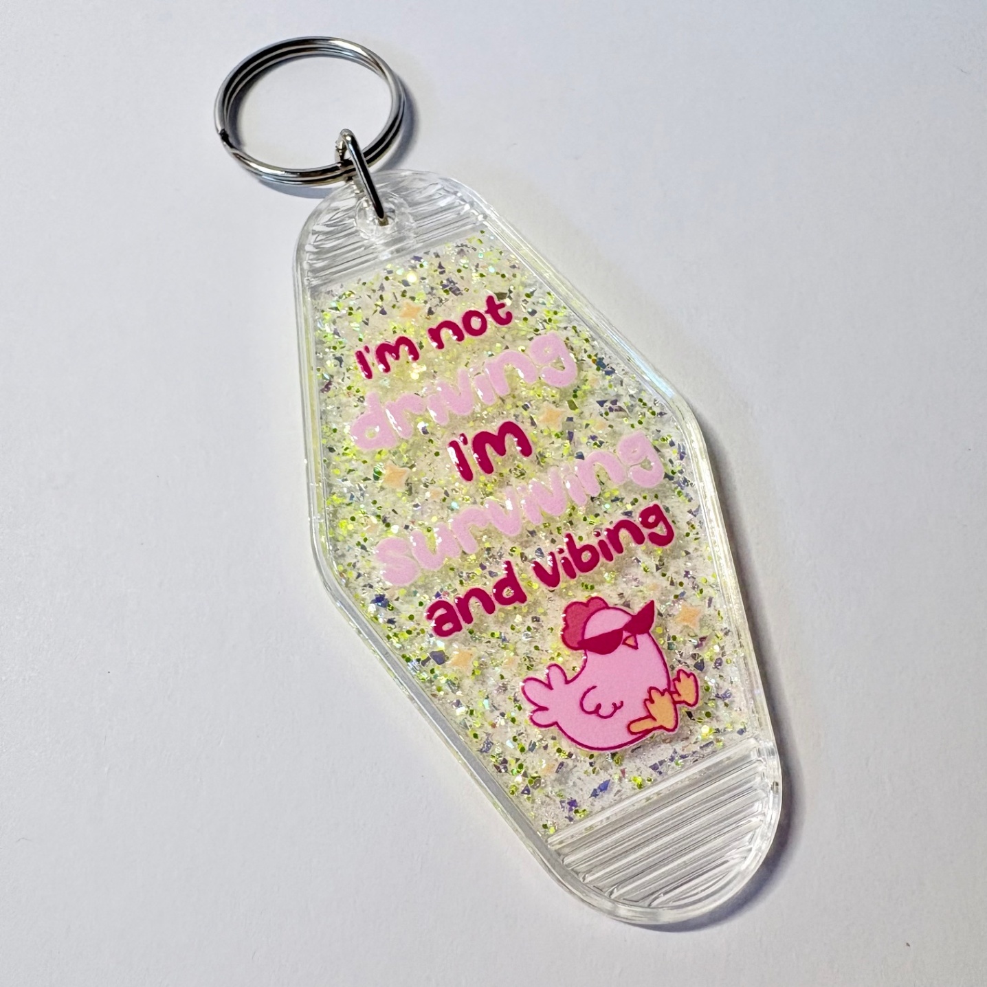 "Surviving and Vibing" Pink Bird Motel Keychain